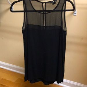 Black tank top blouse with sheer neck